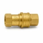 Tandoor Gas Hose AS01 – close-up of brass quick disconnect fitting showing both female threaded ends and gas flow direction arrows engraved on body, for connecting tandoor oven to gas supply line