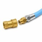 Tandoor Gas Hose AS01 – brass quick disconnect gas coupling shown separated from the male hose end fitting, illustrating the one-hand disconnect mechanism that allows safe and easy disconnection of the tandoor oven from its gas supply