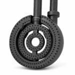 Tandoor Oven Burner AS06 – low side angle view of cast iron triple-ring burner showing depth and thickness of the three-ring concentric body, dual vertical gas inlet pipes, and open centre port, on white background