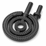 Tandoor Oven Burner AS06 – three-quarter angled view of cast iron triple-ring burner showing full disc profile with three concentric rings of drilled gas holes, dual side-exit gas inlet pipes at top, and open centre pilot port, on white background