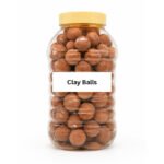 Tandoor Oven Clay Balls AS07 – large clear plastic jar with gold lid filled with terracotta clay balls, showing white label reading Clay Balls, on white background