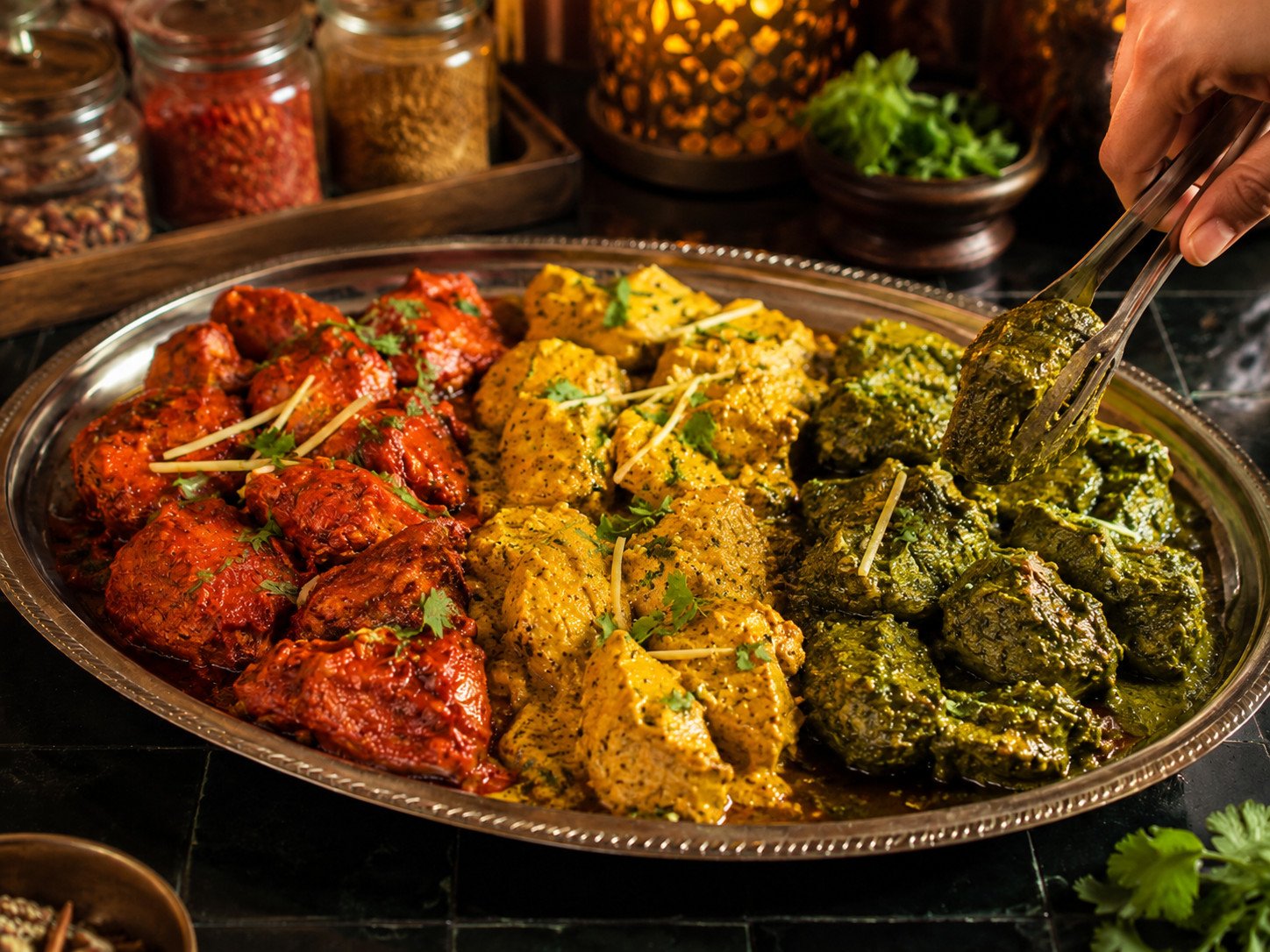 Chicken rangreza recipe Step 7: finished dish garnished with ginger, chillies, and coriander